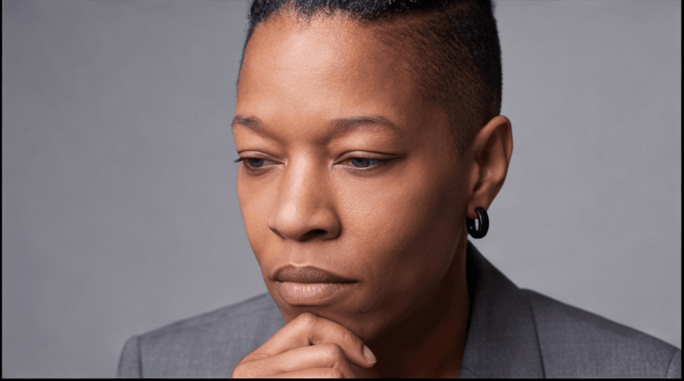 A thoughtful leader in a studio portrait